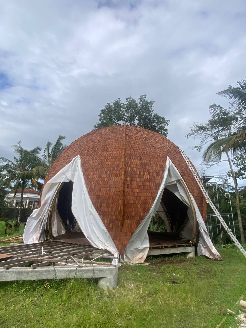 Trishula Dome front exterior with shingle cladding